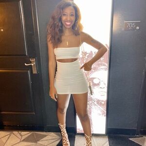 Cute mini dress with front slit.